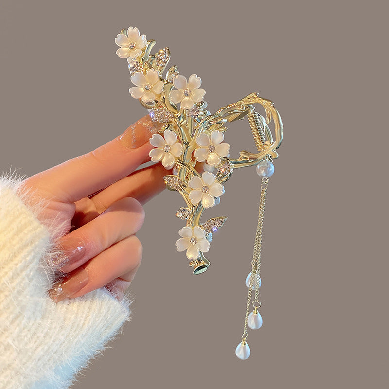 Pearl Orchid Tassel Claw 1